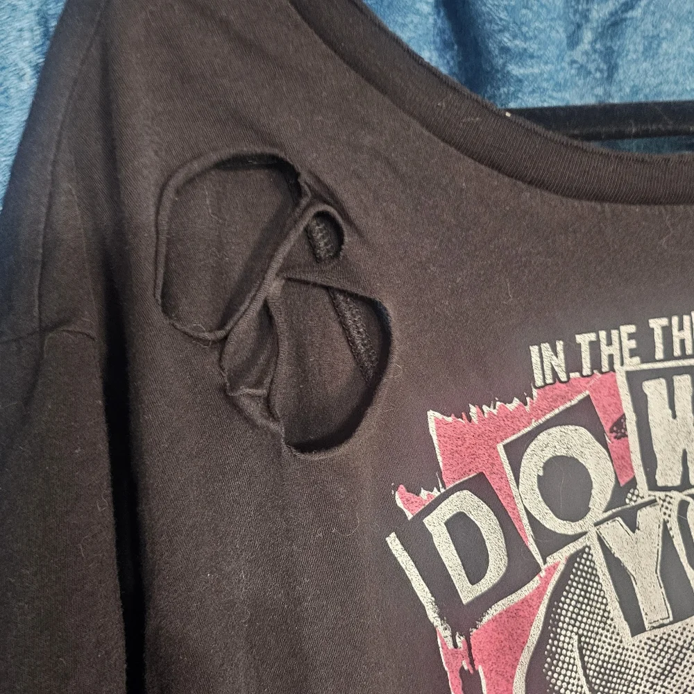 Torrid Distressed Open Back Black Graphic Tee with Skull Design - Picture 2 of 4